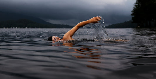 Person Swimming in a Lake